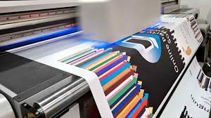 Wide-format printer printing a banner.